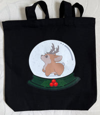 “First Snowfall featuring Dolphy the Reindeer” Tote Bag